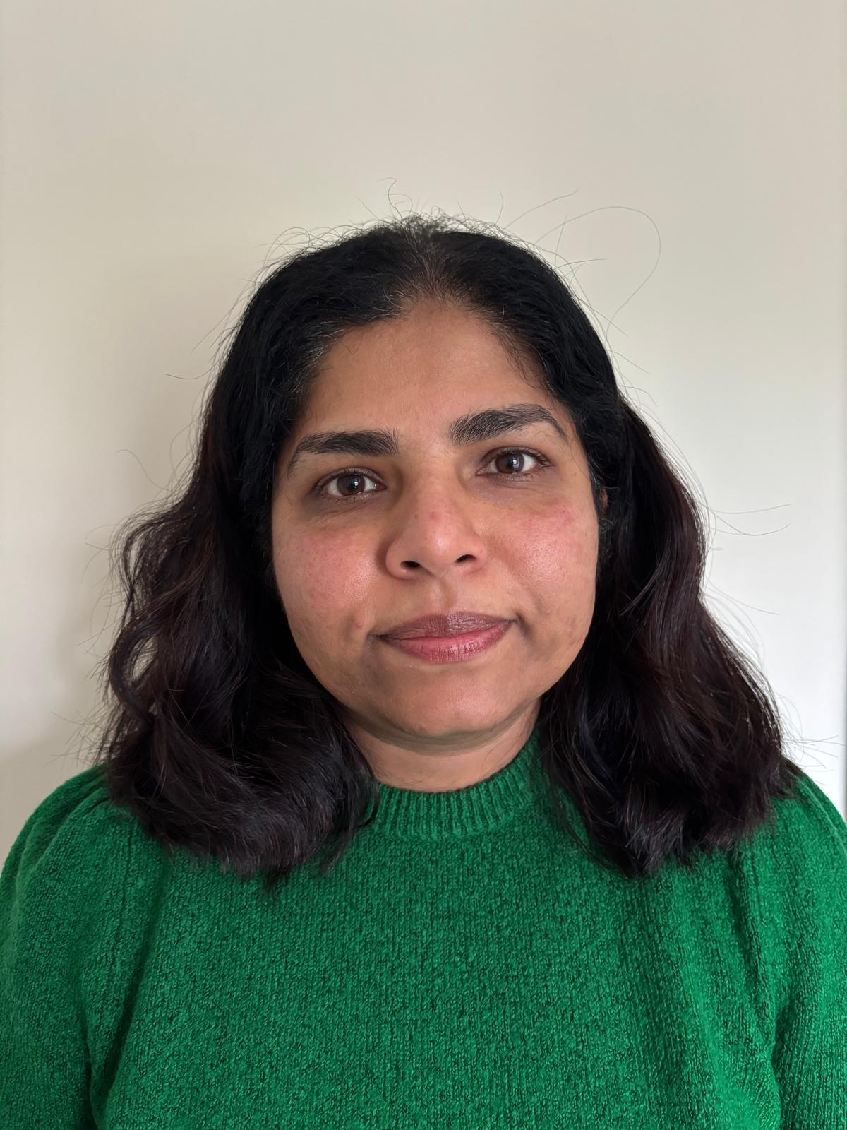 Dr. Midhu Raju